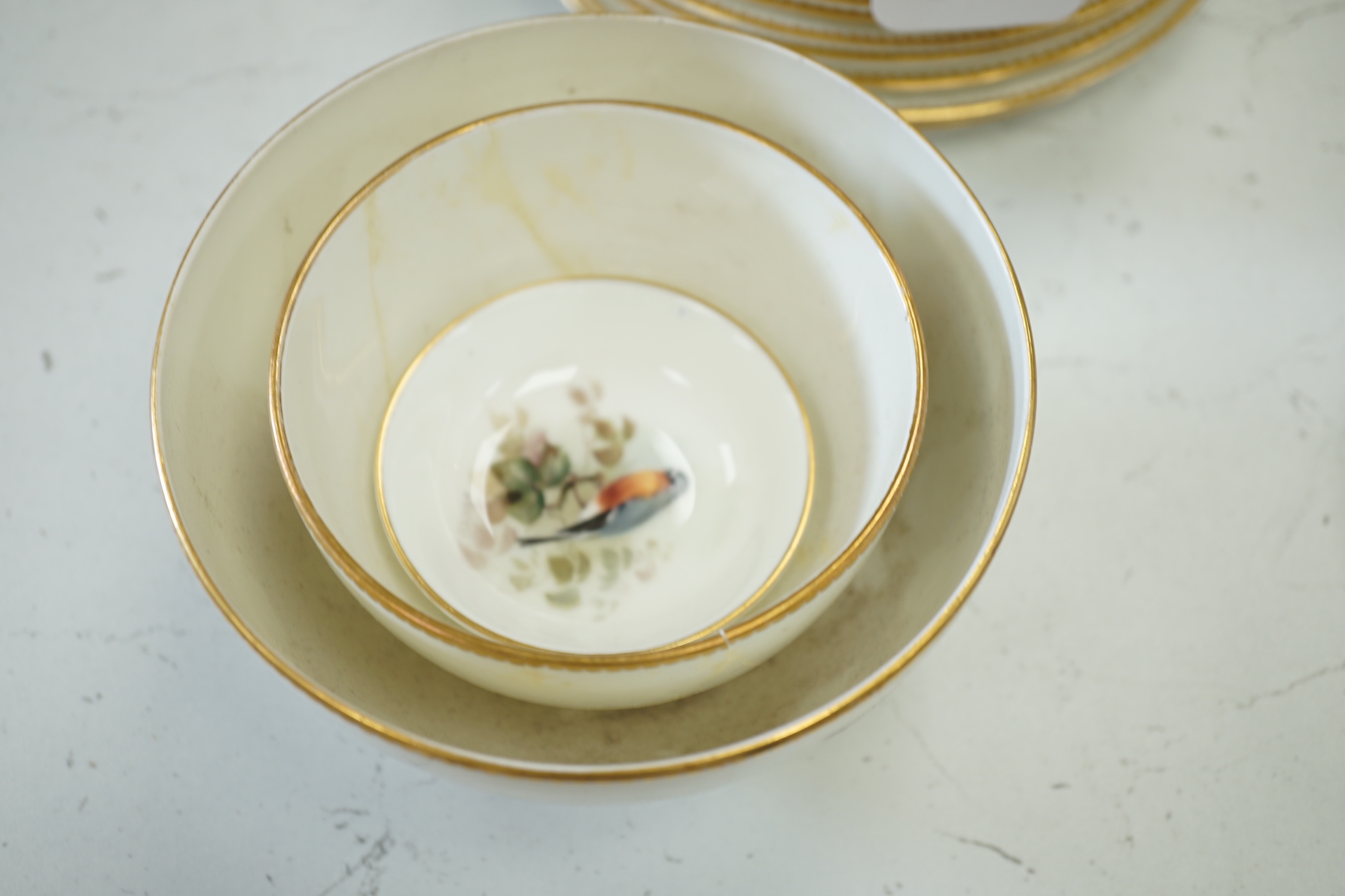 A Royal Worcester titled bird part tea set painted by W Powell